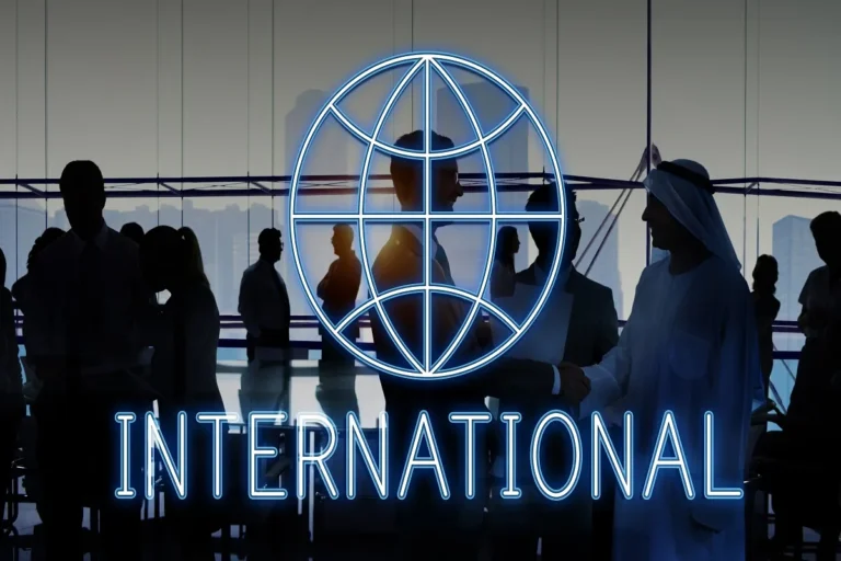 International business meeting with global globe icon and professionals.